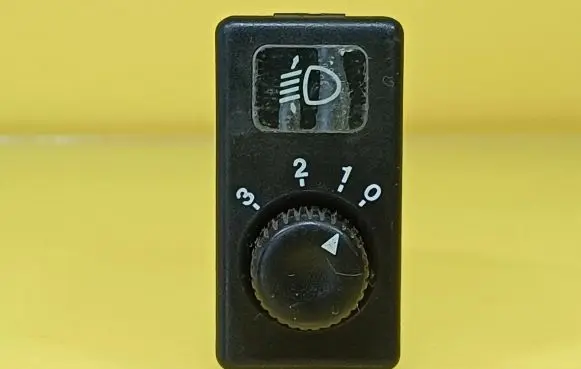 KIA Sportage Headlight level height control switch