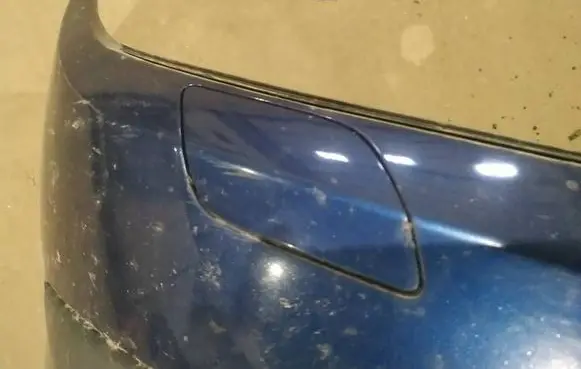 Headlight washer spray nozzle cap/cover