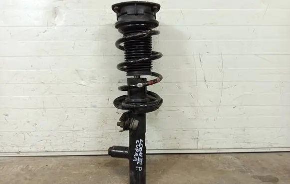 Seat Leon (5F) Front shock absorber with coil spring 5Q0413031FM