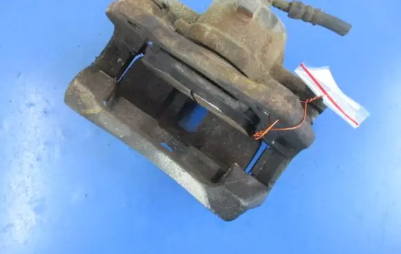 Nissan Almera Tino Front brake caliper