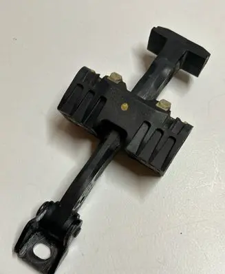 Rear door check strap stopper