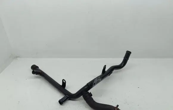 Volkswagen Golf IV Engine coolant pipe/hose 038121065