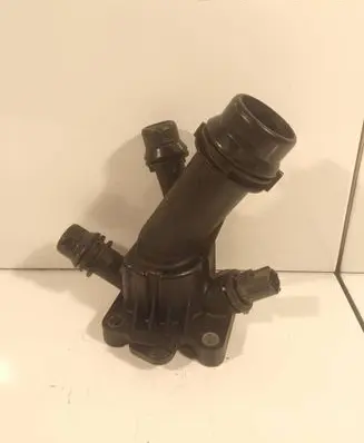 Thermostat/thermostat housing