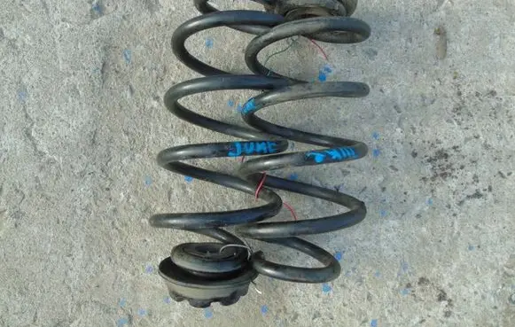 Nissan Juke I F15 Rear coil spring