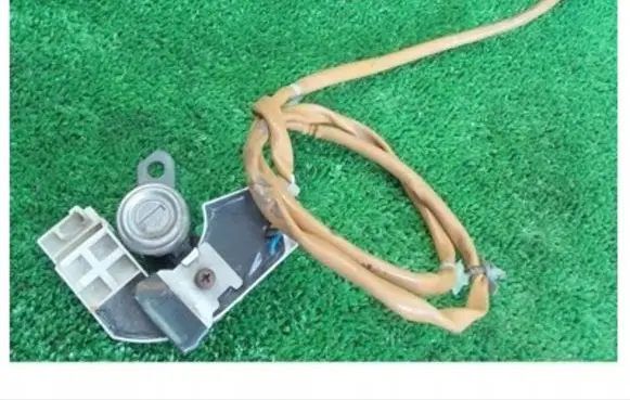 Nissan Maxima Front door lock (next to the handle) 