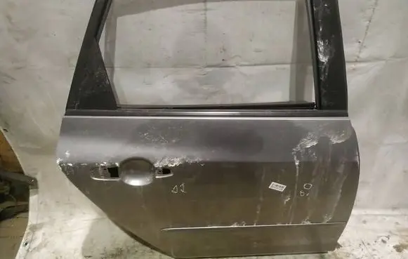Mazda 3 I Rear door PILKOS
