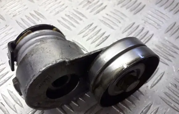 Opel Astra H Alternator belt tensioner pulley 950240
