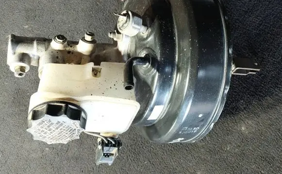 Mazda 323 F Brake booster 40660998