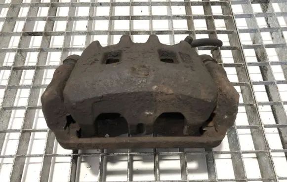 Subaru Forester SF Front brake caliper