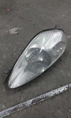 Fiat Grande Punto Headlight/headlamp 89101387