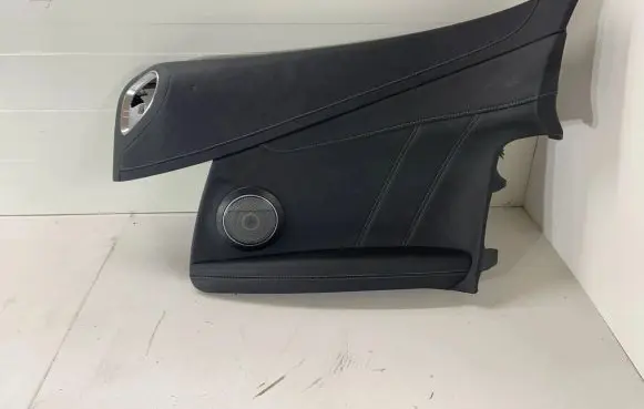 Coupe rear side trim panel