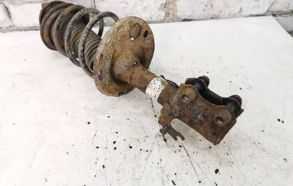 Toyota Avensis T270 Front shock absorber with coil spring