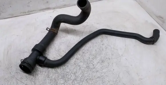 Volkswagen PASSAT B5 Engine coolant pipe/hose 8D0121055F