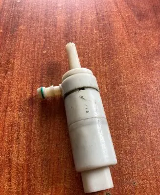 Headlight washer pump