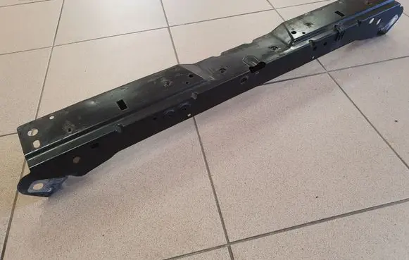 Top upper radiator support slam panel