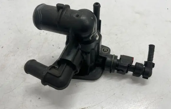 Thermostat/thermostat housing