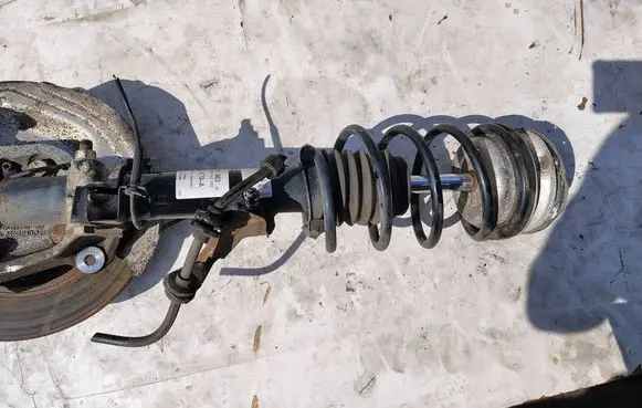 BMW 1 E81 E87 Front shock absorber with coil spring 