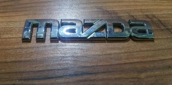Mazda 626 Manufacturer badge logo/emblem 