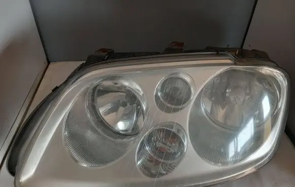 Volkswagen Touran I Headlight/headlamp 0301205203
