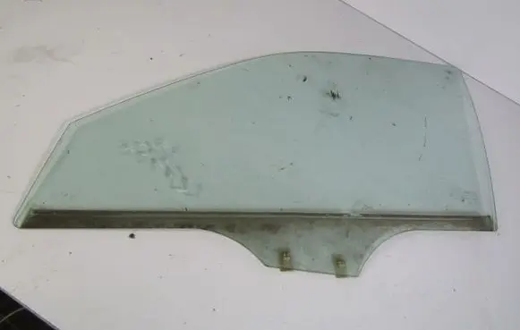 Mazda 323 Front door window glass four-door 