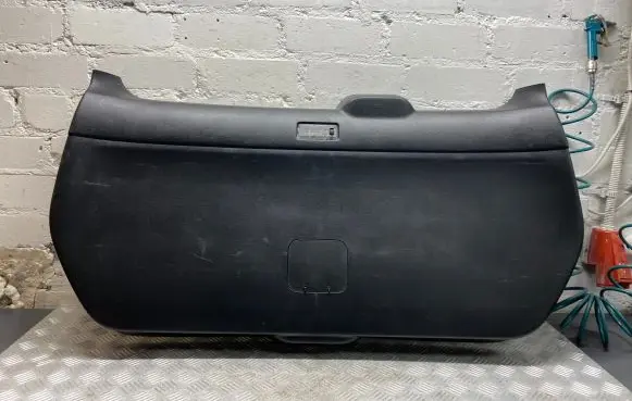 Trunk/boot lower side trim panel