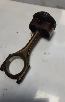 Piston with connecting rod