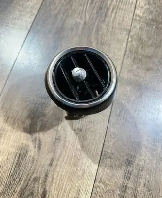 Dash center air vent grill