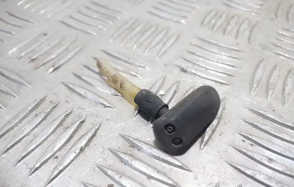Windshield washer spray nozzle