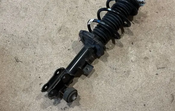 Hyundai Ioniq 5 Front shock absorber with coil spring 54651GI370