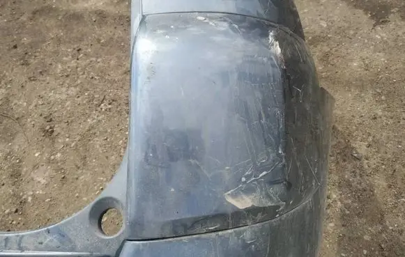 Rear bumper trim bar molding