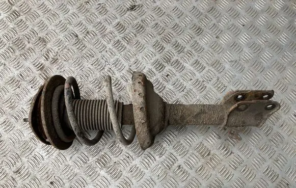 Subaru Outback Front shock absorber with coil spring