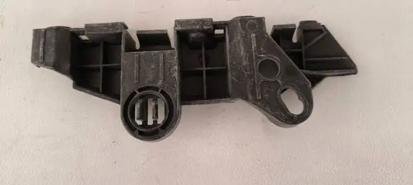 Opel Corsa D Front bumper mounting bracket 39003564