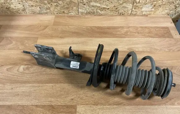 Citroen C4 I Front shock absorber with coil spring 3452