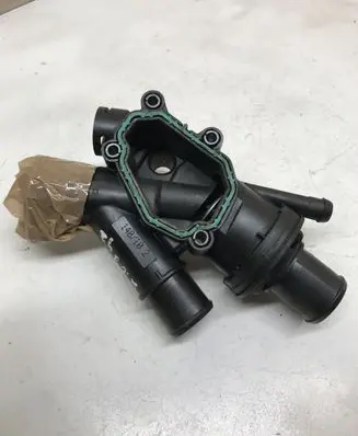 Thermostat/thermostat housing