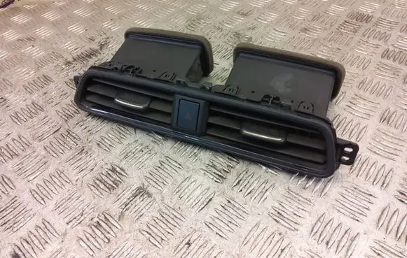 Nissan Leaf II (ZE1) Dash center air vent grill 687505SK0B