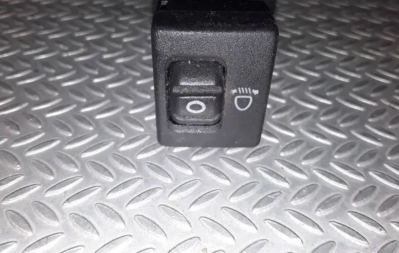 Headlight level height control switch