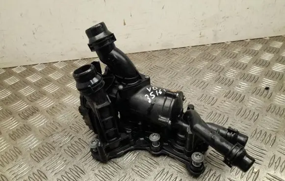 Thermostat/thermostat housing
