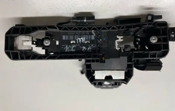 Rear door exterior handle/bracket