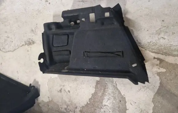 Trunk/boot lower side trim panel