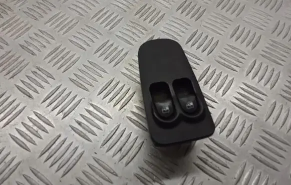 Lancia Ypsilon Front door window switch trim 735360604