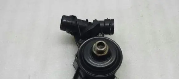 Thermostat/thermostat housing