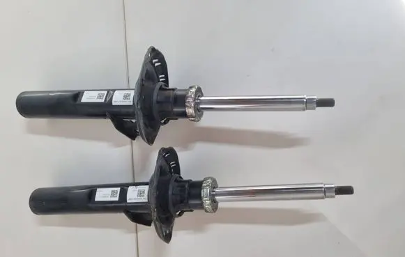 Skoda Octavia Mk4 Front shock absorber with coil spring 5WA413031T 5WA412021LT
