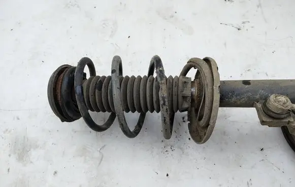 Peugeot Partner Front shock absorber with coil spring