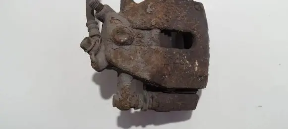 Suzuki Swift I Front brake caliper