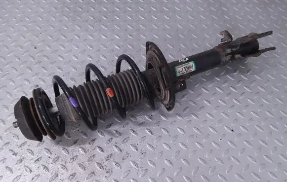 Suzuki Swift III Front shock absorber with coil spring 4160253RA0
