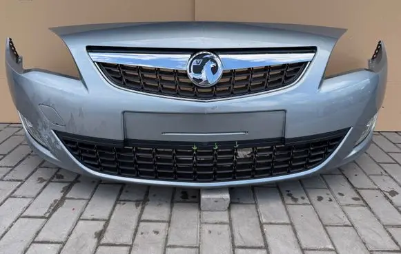 Opel Astra J Front bumper 13264403