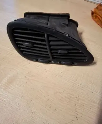 Volkswagen Golf IV Dash center air vent grill 7M1819728E