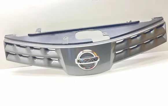 Nissan Note (E11) Front bumper upper radiator grill