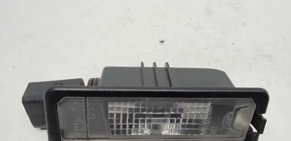 Volkswagen Golf VI Number plate light 1K8943021