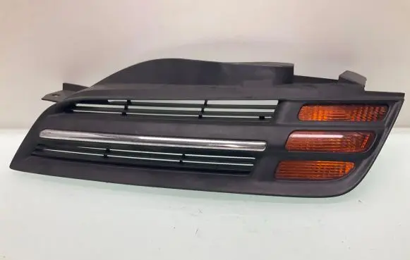 Nissan Micra Front bumper lower grill 62330AX600